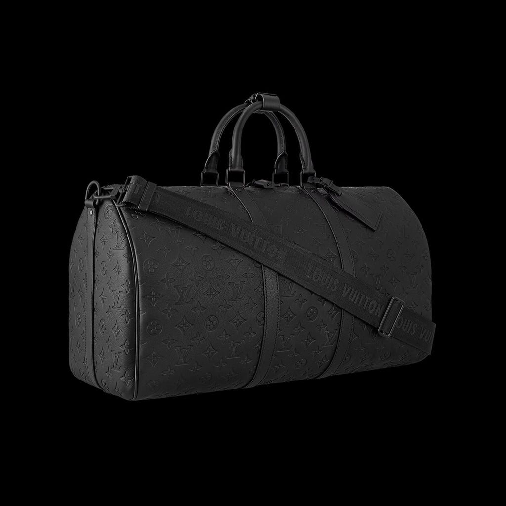 Louis Vuitton Keepall Bandoulière 50 in black embossed monogram leather.