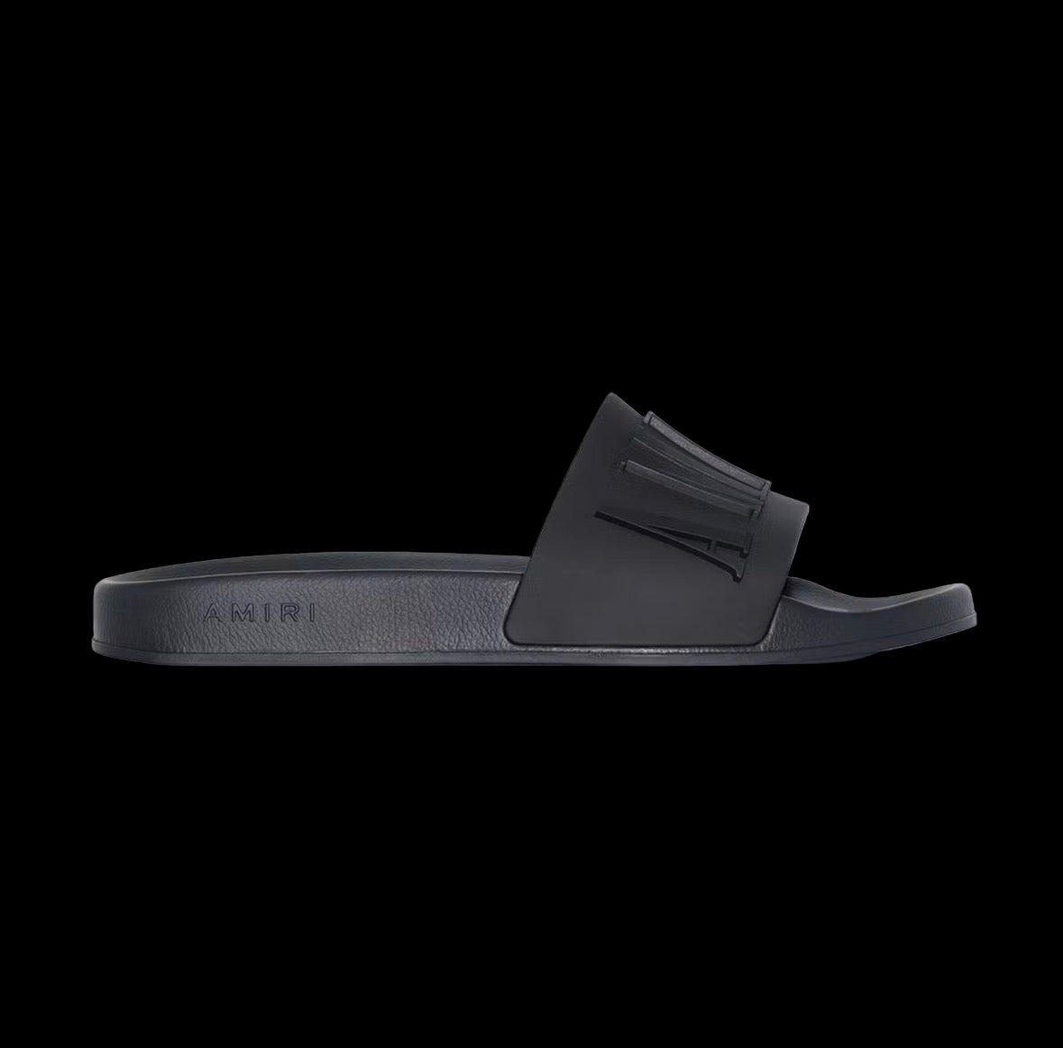 Black Amiri pool slides with a textured upper and cushioned sole for comfort.