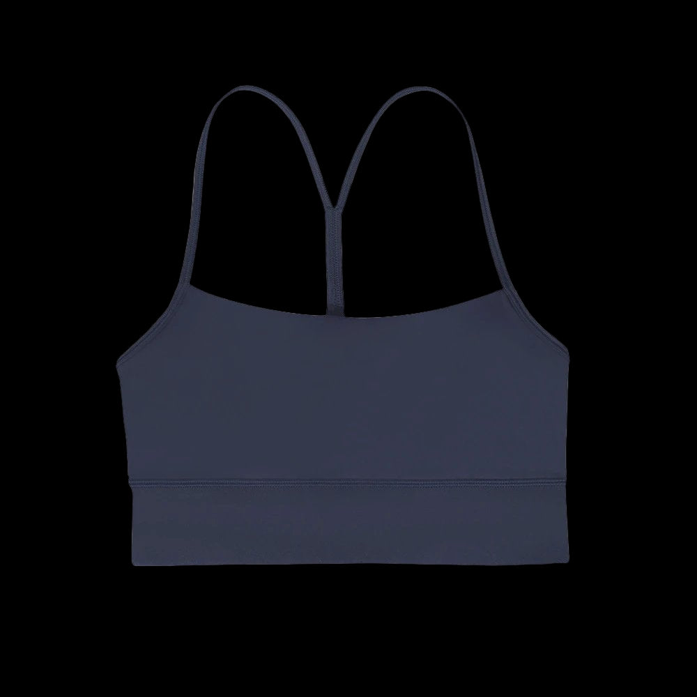 Lululemon Flow Y Nulu Sports Bra in light pink with a Y-back design and soft fabric.