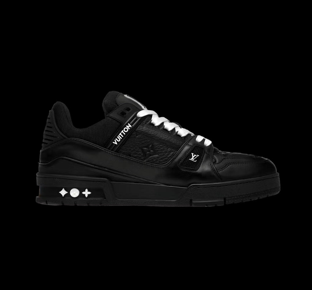 Black Louis Vuitton Trainer sneakers with embossed monogram and white laces.