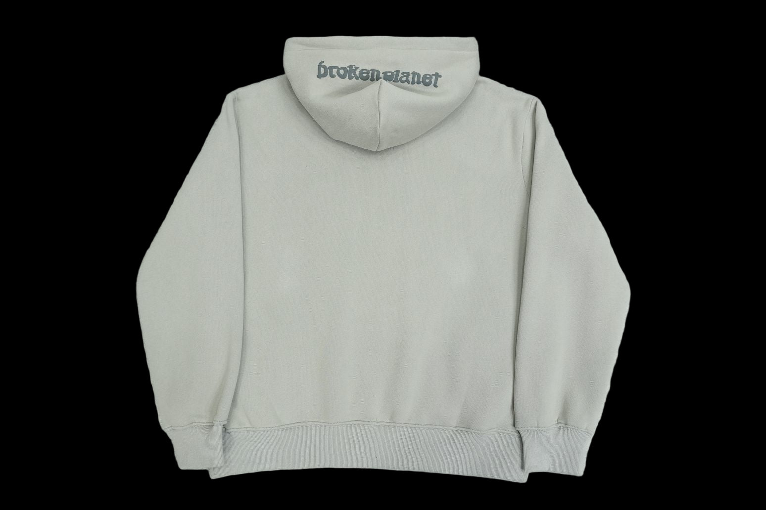 Broken Planet Falling Stars Hoodie in light grey with a logo on the hood.