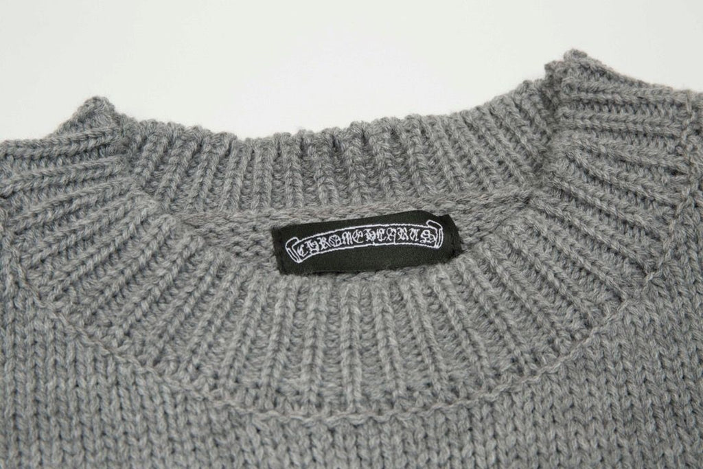 Chrome Hearts distressed knit with faded wash, ribbed crewneck, and short sleeves in heavyweight cotton.