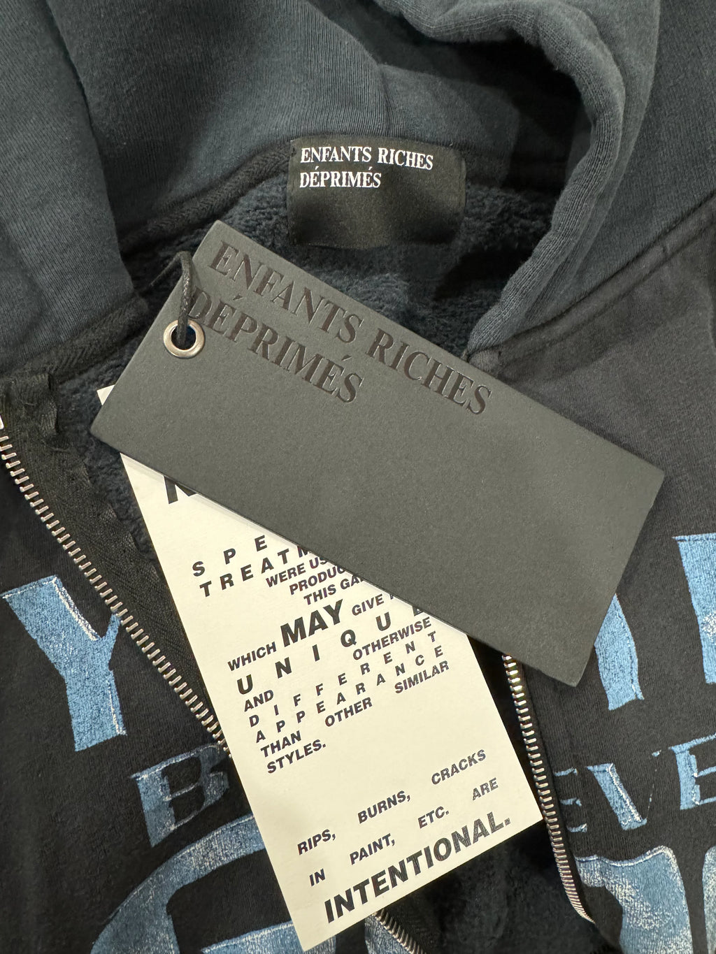 Zip-up sweatshirt in heavyweight cotton with "Rhude Roadway Racing" graphic and ribbed crewneck.