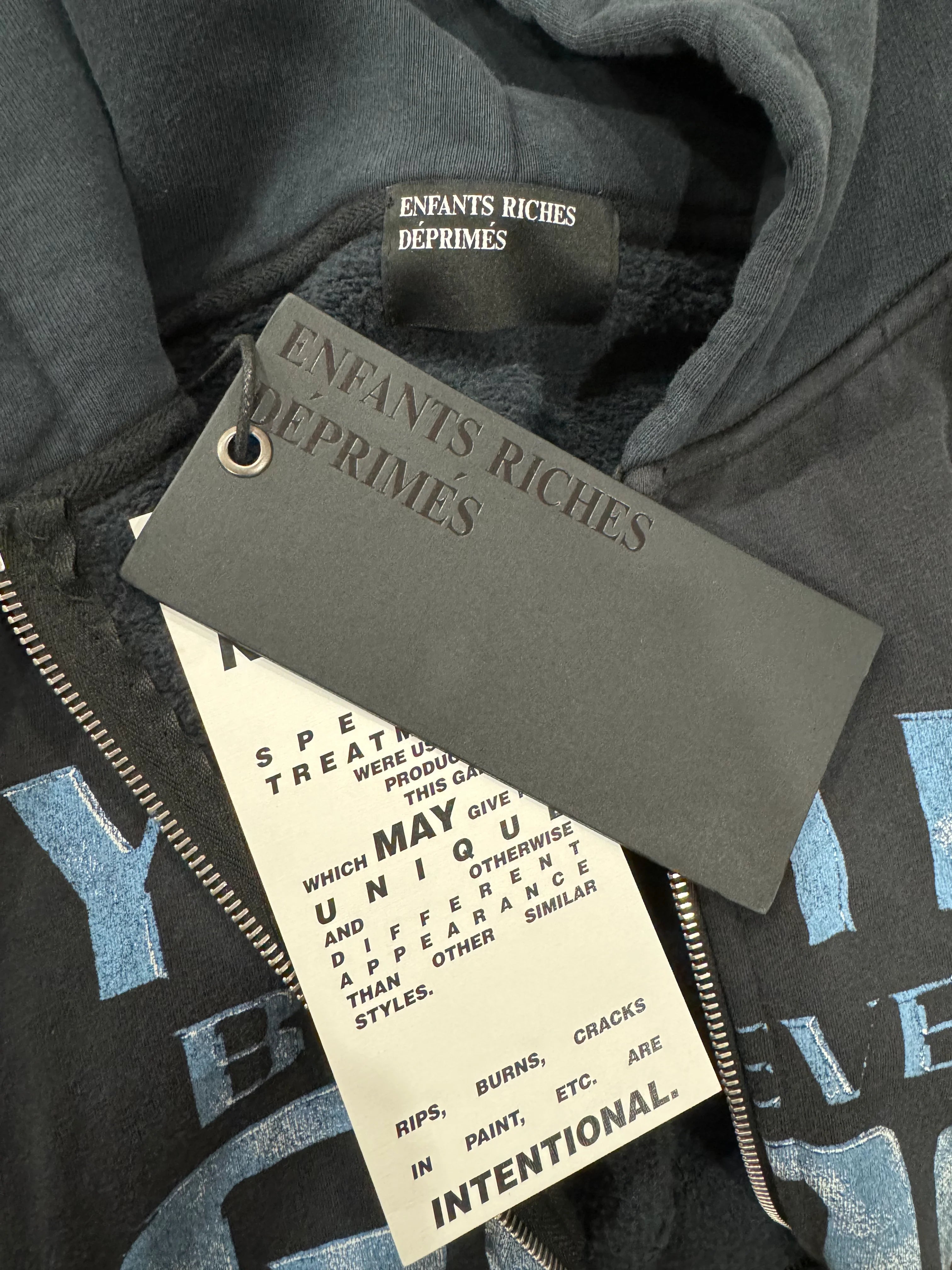 Zip-up sweatshirt in heavyweight cotton with "Rhude Roadway Racing" graphic and ribbed crewneck.