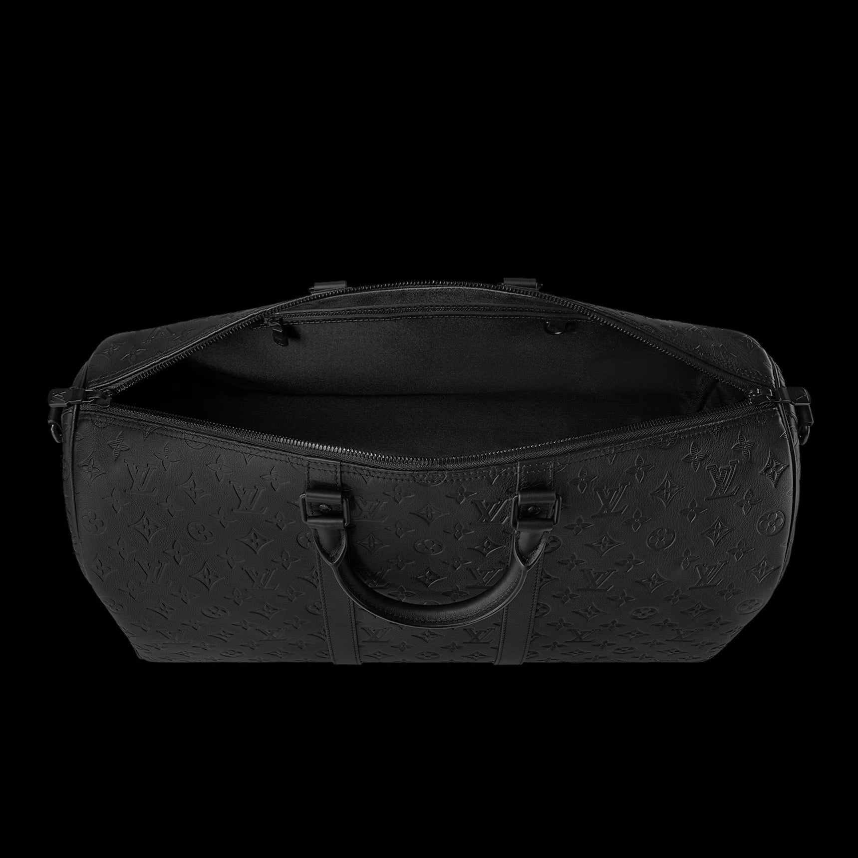 Louis Vuitton Keepall Bandoulière 50 in black embossed monogram leather.