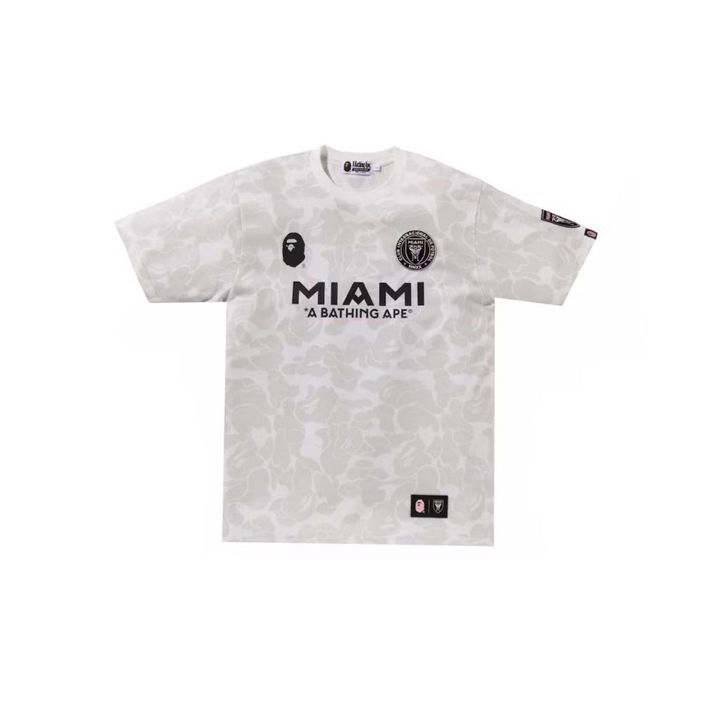 BAPE x Inter Miami Camo T-shirt with a faded wash, ribbed crewneck, and short sleeves.