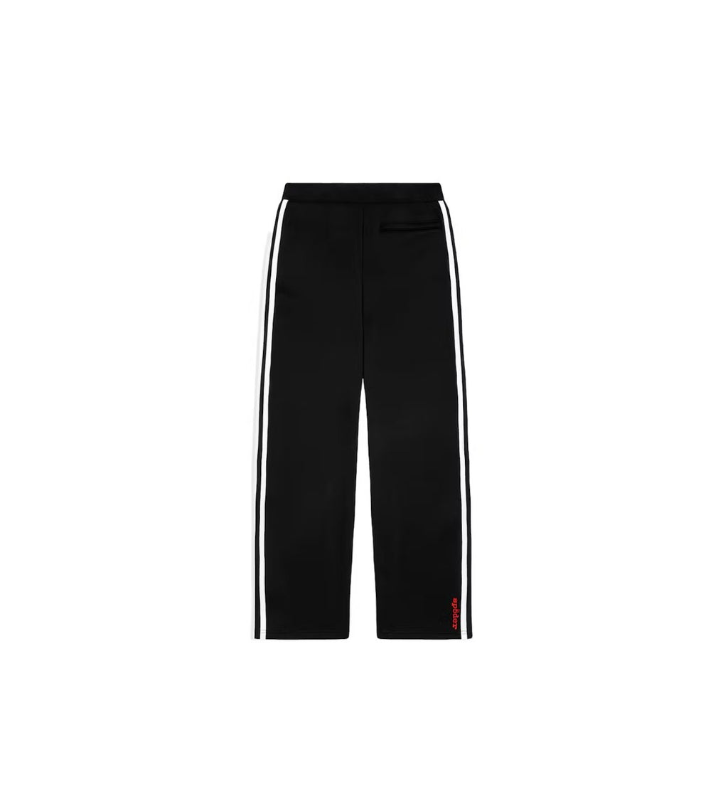 Sp5der 5ex Trackpants in faded wash with ribbed waistband and tapered legs.