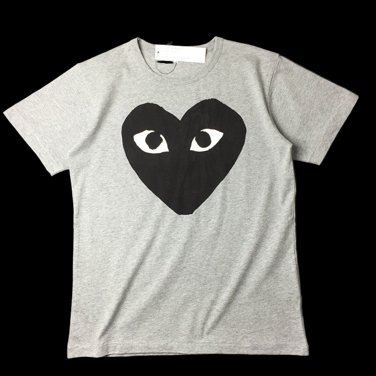 Black Comme Des Garcons Play T-shirt with red heart logo on chest and ribbed crewneck collar