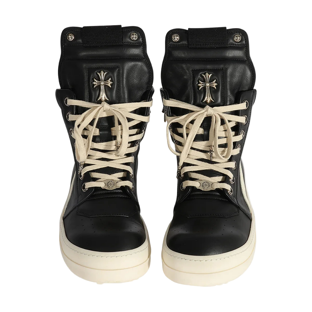 Black high-top sneakers with a unique design and textured fabric.