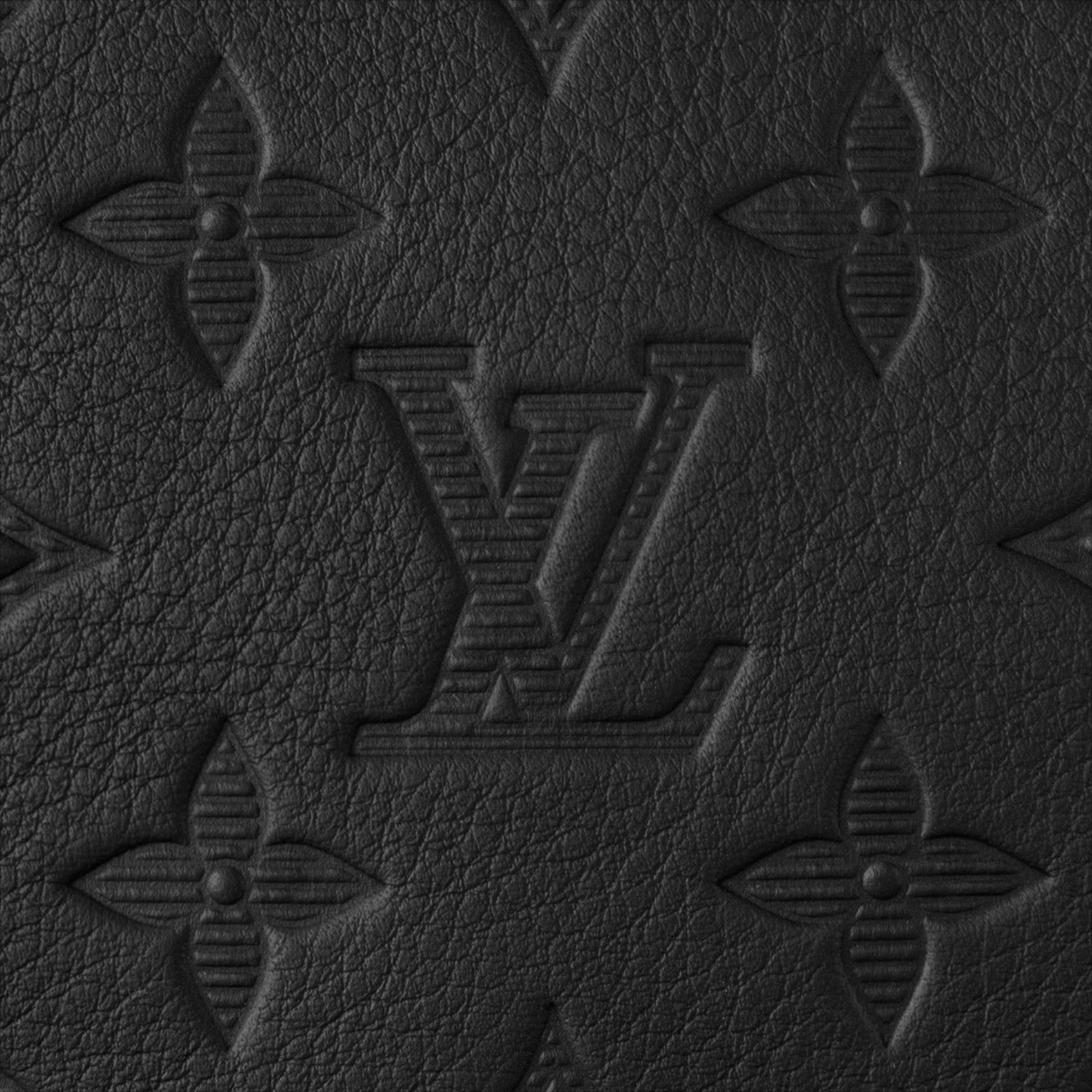 Black leather with embossed Louis Vuitton monogram pattern.
