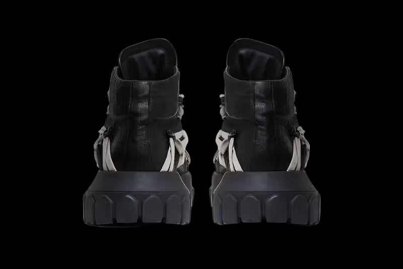 Black Rick Owens Tecuatl Tractor Sneakers with a chunky sole and sleek design.