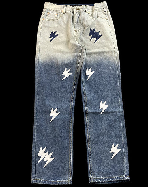 Faded gradient jeans with a lightning bolt design and a relaxed fit for comfort and style.