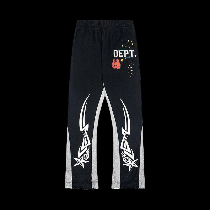 Gray sweatpants with vintage faded wash and multicolor paint splash print on cotton fabric