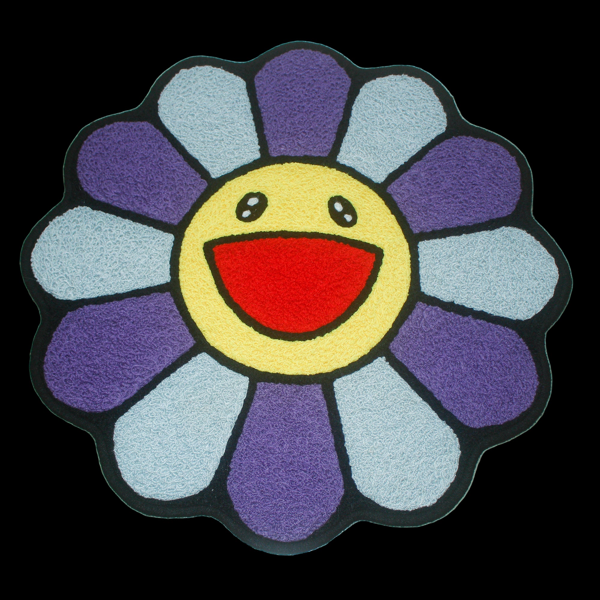 Colorful floor mat rug featuring Takashi Murakami's iconic floral designs.