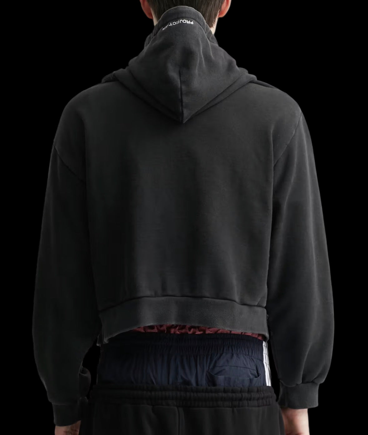 Black hoodie featuring Rhude Roadway Racing graphics on front and back with ribbed crewneck.