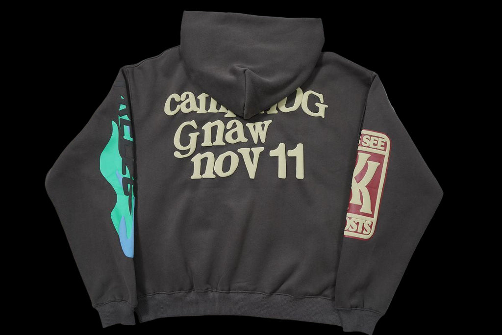 CPFM lucky me i see ghosts Hoodie with graphic details on sleeves and text on back.