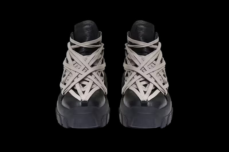 Black Rick Owens Tecuatl Tractor Sneakers with a chunky sole and sleek design.