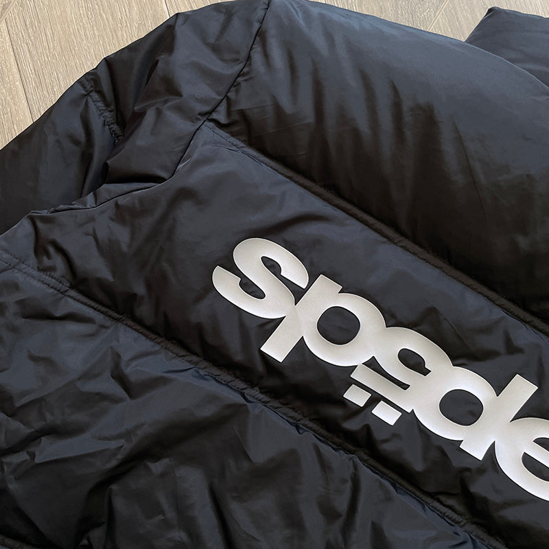 Black puffer jacket with a sleek design and tailored fit for comfort and warmth.