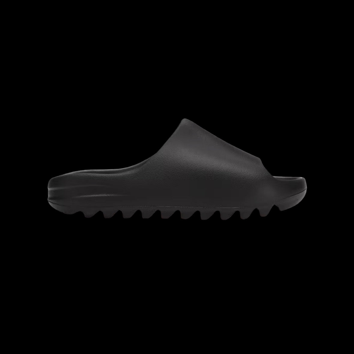 Adidas Yeezy Slides in multiple colorways with a sleek design and comfortable fit.