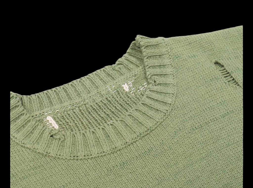 A cozy, vintage-inspired sweater with a skeleton graphic and ribbed crewneck.