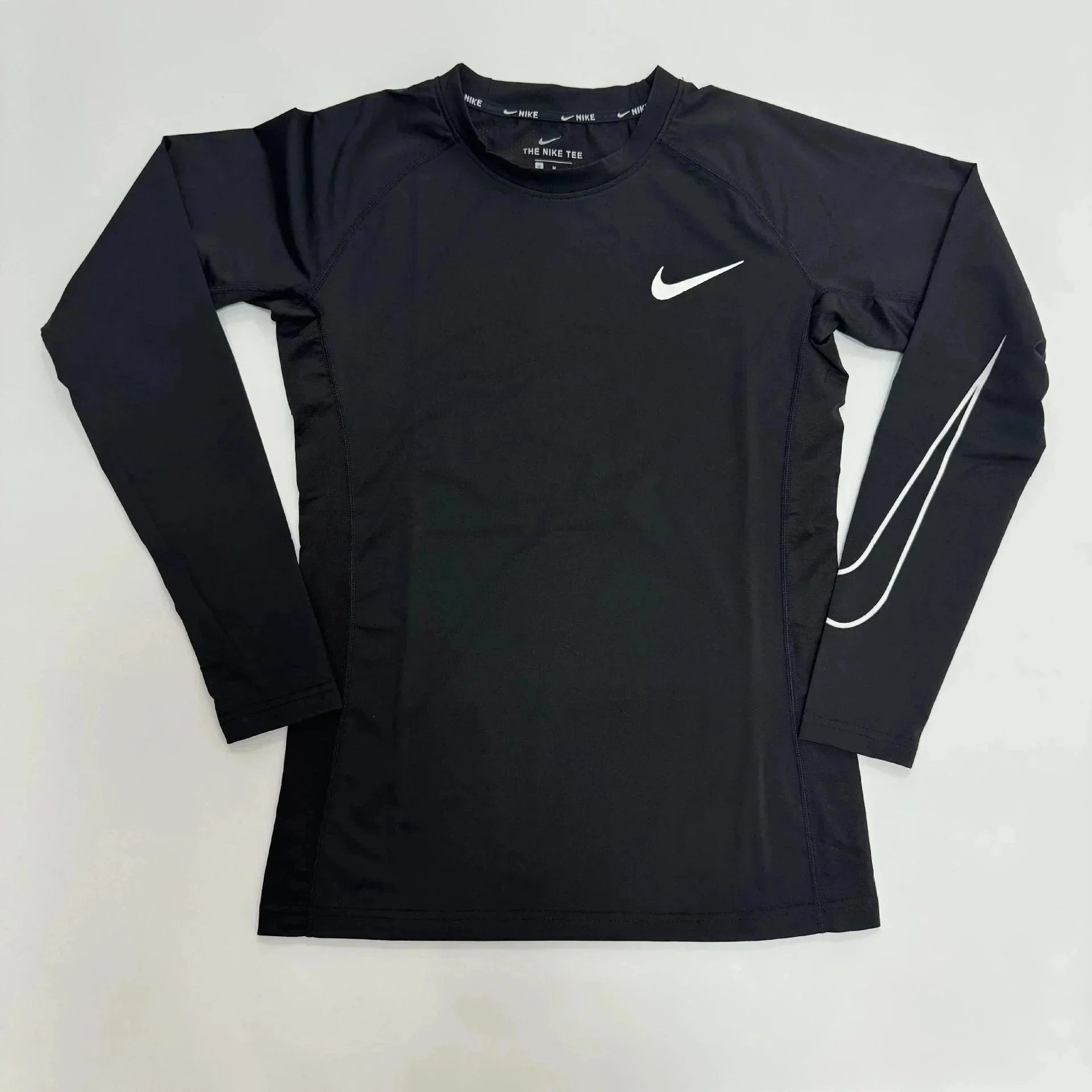 Nike Pro Dri-Fit Compression long sleeve shirt in black with moisture-wicking fabric and snug fit