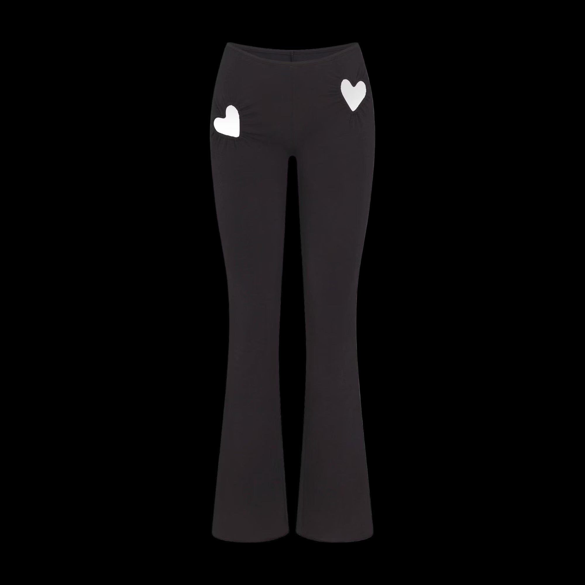Black cotton pants with heart-shaped cutouts along the sides and a faded wash finish