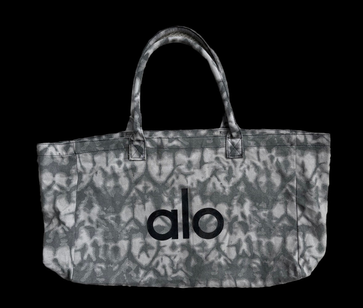 Lightweight Alo Shopper Tote Bag with a roomy main compartment and comfy shoulder straps.