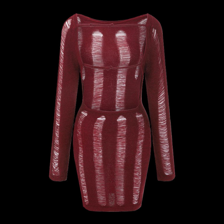 Black mini dress with shredded detailing and an open back design.